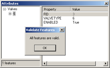 Attributes dialog and the feature validation message shown in ArcMap